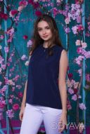 Блуза свободного кроя с удлиненной спинкой 48/50рр