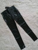 Брюки эко кожа в темно-зеленом цвете