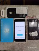 Телефон Galaxy J2, модель SM-J250F/DS.