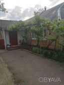 Житловий будинок з надвірними спорудами
